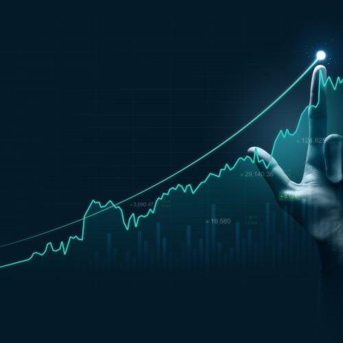 Businessman,Hand,Pointing,Finger,To,Growth,Success,Finance,Business,Chart